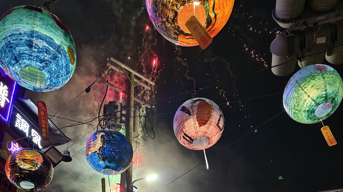 Spring festival fireworks above hand painted lanterns in Puji Temple, Tainan